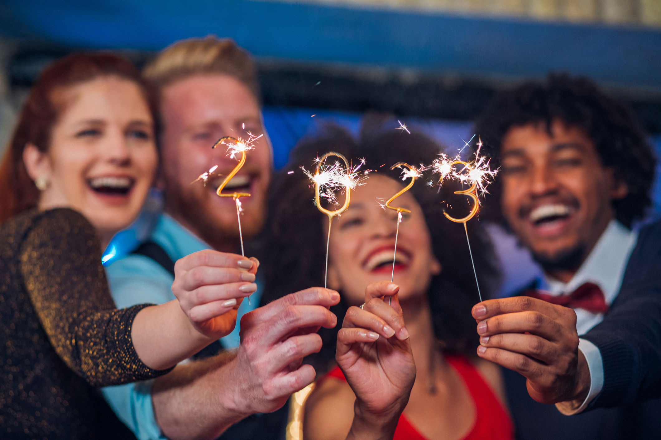 group, friends, travelers, couples, celebration, New Year's, 2023, sparklers